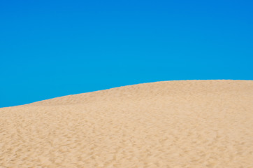 Fototapeta na wymiar Sand dunes in National park of Maspalomas, Gran Canaria