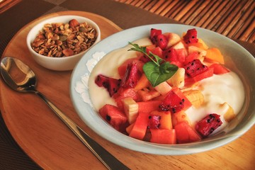 A vegan breakfast of smoothie bowl with muesli as a way to stay healthy