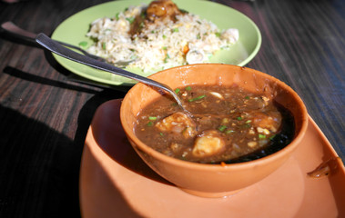 Thai food - rice with meat, vegetables and sauce
