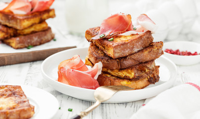 French toasts with italian prosciutto for delicious breakfast
