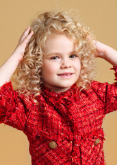 portrait of little model girl in studio