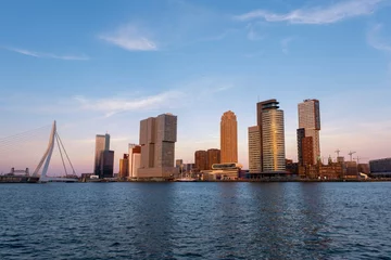 Fotobehang Erasmusbrug Rotterdam Skyline with Erasmusbrug bridge at sunset in morning in Rotterdam, Netherlands