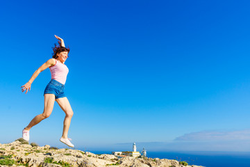 Woman enjoy trip in Spain. Mesa Roldan lighthouse location, Almeria Spain.