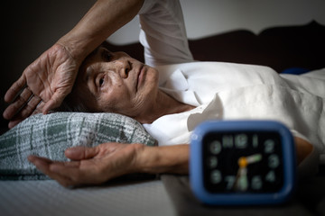 Tired,exhausted asian senior woman suffering from insomnia for months,chronic insomnia,unable to...
