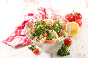 tabbouleh- semolina salad with tomato, cucumber and parsley
