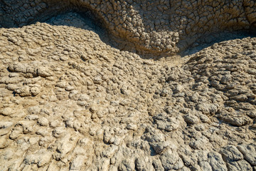cracked earth and the arid area of ​​a hill