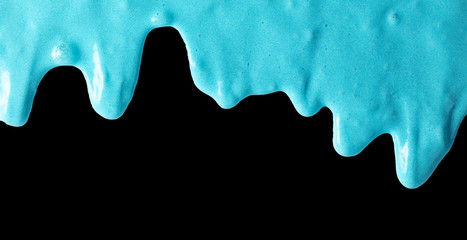 Blue slime isolated on black background.