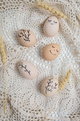 Easter eggs and easter bunny on white background with copy space. Easter background. Top view