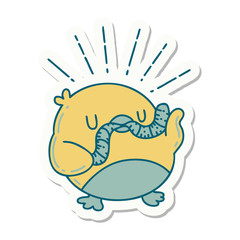 sticker of tattoo style robin with worm