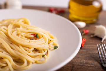 Italian spaghetti with garlic, olive oil, hot pepper and parsley. Fast and healthy lunch.