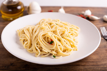 Italian spaghetti with garlic, olive oil, hot pepper and parsley. Fast and healthy lunch.