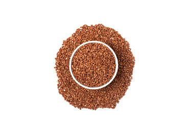 Dry buckwheat in white ceramic cup isolated on white background