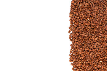 Dry buckwheat isolated on white background with copy space.