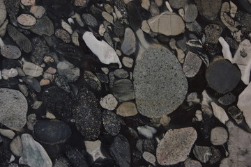 Granite with different stones in black and gray shades of color, a natural stone called Nero Marinace