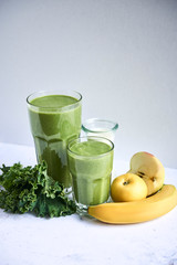 Close up of green smoothie with fruits © 4Media Creations