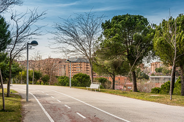 walk in a public park and in the background the buildings of the city of three songs. Madrid Spain