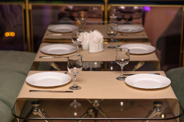 Fototapeta na wymiar Laid table for restaurant guests.