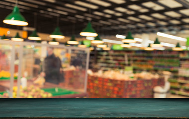 Supermarket background, Counter over blur grocery background, Wooden desk, table, shelf and blur woman shopping at supermarket, Wood counter for grocery store retail product display backdrop, template