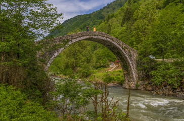 Fototapeta na wymiar Firtina Valley, Turkey - very close to the Black Sea coast, the Firtina Valley displays some stunning views. Here in particular one of the many bridges on the Firtina river
