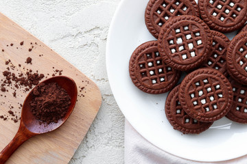 Flat lay cookies with cocoa on a white wooden background