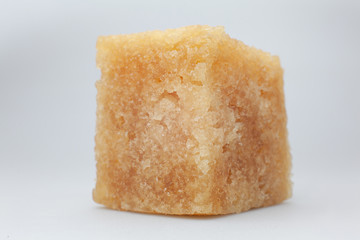 one cube synthetic rubber sample on a white background shot close in the studio