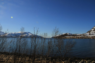 sunset, sky, sun, sunrise, nature, clouds,  landscape, evening, light, sea, cloud, blue beautiful, horizon, red, sunlight, mountain view, ocean tromso tromsø  water travel tourism sea coast nature 