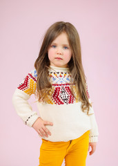 portrait of little model girl in studio