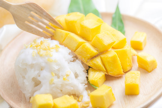 fresh ripe mango and sticky rice with coconut milk, authentic Thai dessert high resolution