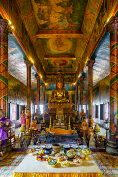 Inside and outside the Wat Phnom temple in Phnom Penh, Cambodia. Beautiful view of center in Phnom Penh, Cambodia