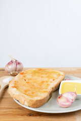 Bread with tomato and garlic with olive oil, a classic aperitif in Catalan and Spanish cuisine, eaten at breakfast. Food concept.