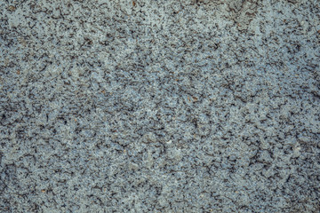 Closeup fragment of grunge weathered wall of a building