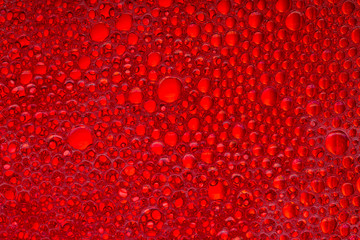 Texture of red soap foam