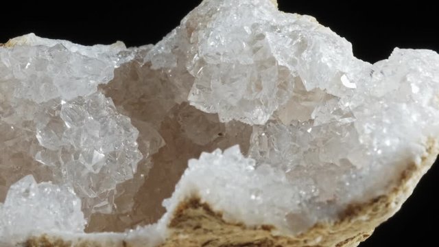 Large crystals of rhinestone quartz, rock-crystal black background. macro