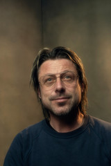 Fototapeta premium Studio portrait of a man wearing retro eyewear.