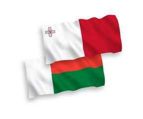 Flags of Malta and Madagascar on a white background