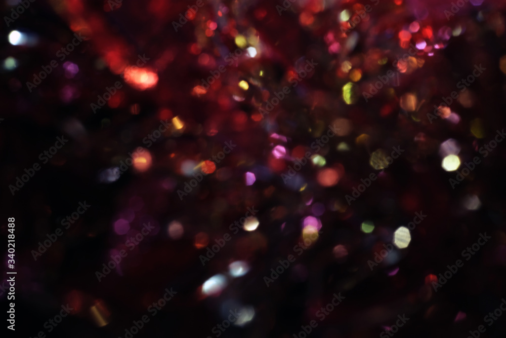 Wall mural dark abstract red bokeh sparkle on black background