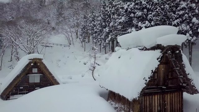 The traditionally thatched houses in Shirakawa-go where is the mountain village among the snow near Gifu, Ishikawa, and Toyama prefecture in the winter, Japan