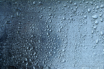 raindrops on a metal surface