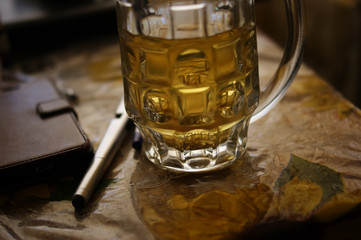 Green tea in a glass beer mug