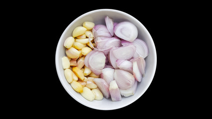 shallot and garlic on white bowl isolated background