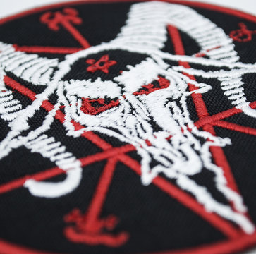 The embroidered patch. Attributes for bikers, rockers and metalheads. A patch with a pentogram and a goat. Baphomet. Occultism, the dark side of the world.