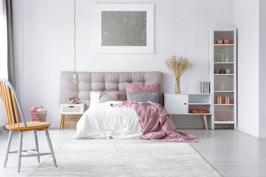 Bedroom with pink and grey accents