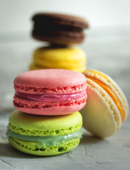 colorful macaroons on a light background dessert