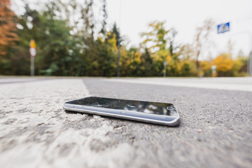 Phone on a crosswalk