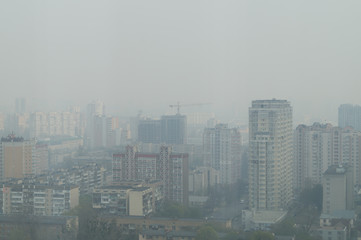 Smoke in the city Kyiv after a fire