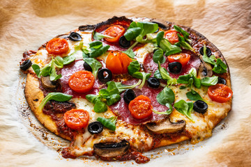 Margherita pizza on baking paper
