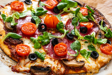 Margherita pizza on baking paper
