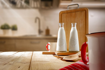 Desk in kitchen and fresh cold milk 