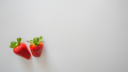 Two strawberry for white background