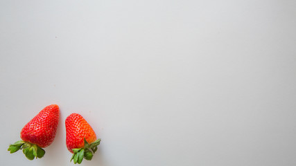Two strawberry for white background